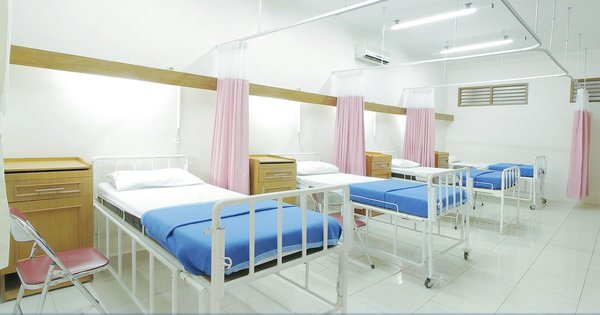empty hospital beds in a ward