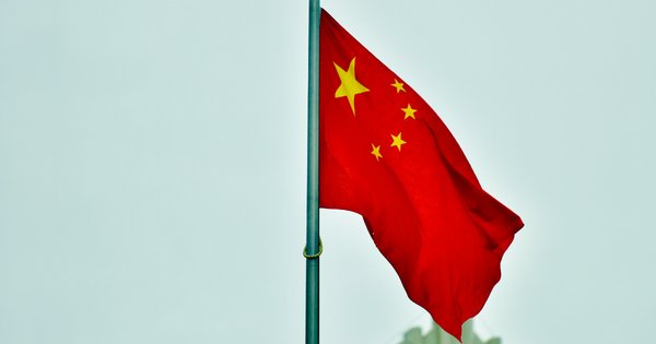 The national flag of China on a flagpole